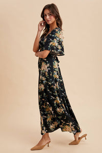 Woman wearing a floral dress on a beige background