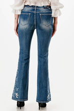 Load image into Gallery viewer, Flared jeans with floral embroidery on a white background