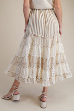 Load image into Gallery viewer, Woman wearing a layered skirt with a neutral background