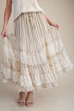 Load image into Gallery viewer, Woman wearing a layered skirt with a neutral background