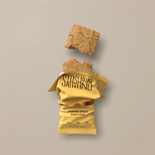 Load image into Gallery viewer, Yellow snack bar with 'Starship Snacks' branding on a beige background