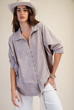 Load image into Gallery viewer, Woman wearing a light purple striped shirt and white pants with a neutral background