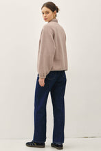 Load image into Gallery viewer, Person wearing a beige sweater and blue jeans on a white background