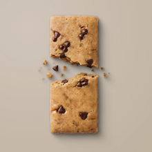 Load image into Gallery viewer, Two chocolate chip cookie bars on a beige background