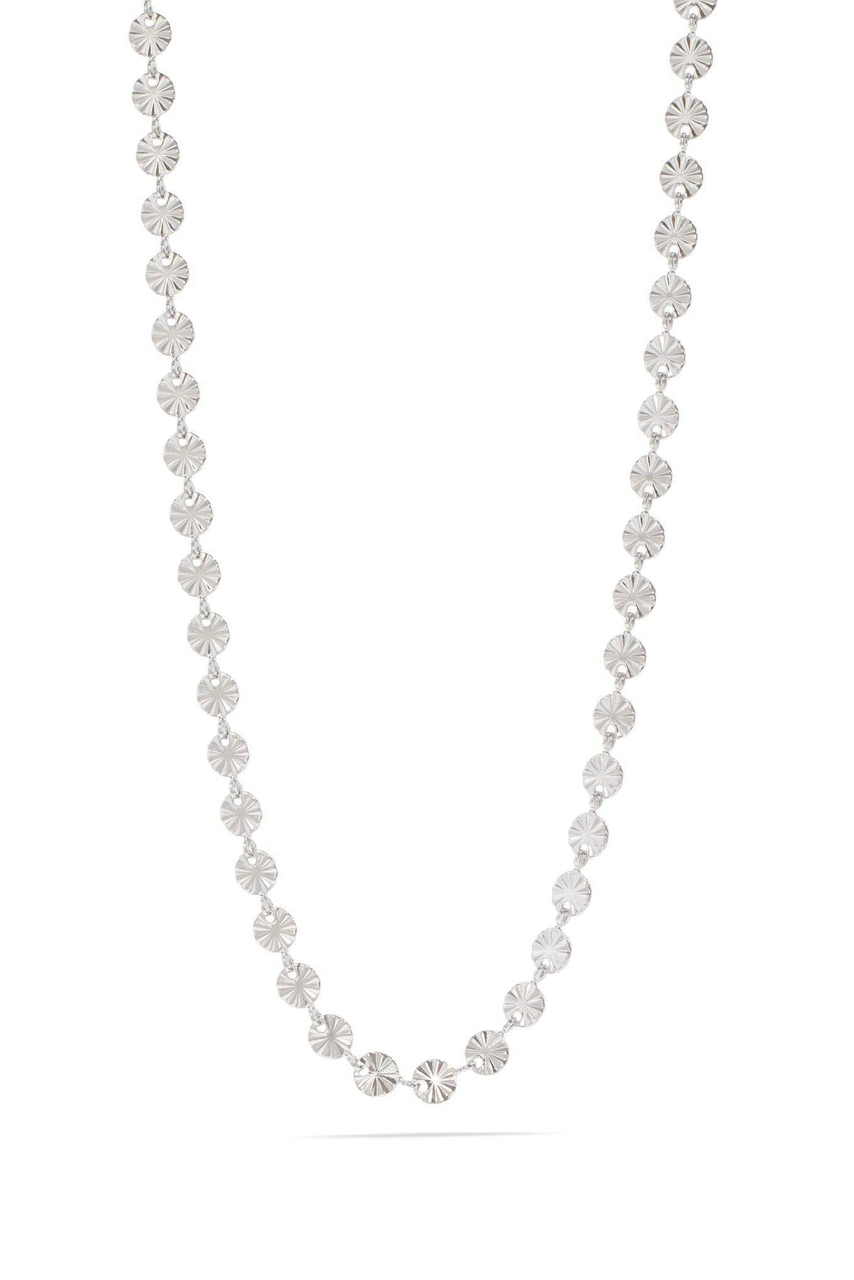 Silver beaded necklace on a white background