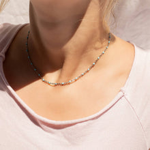 Load image into Gallery viewer, Necklace on a person wearing a light pink top