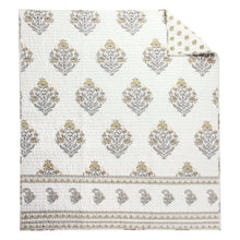 Load image into Gallery viewer, Decorative quilt with intricate patterns on a white background